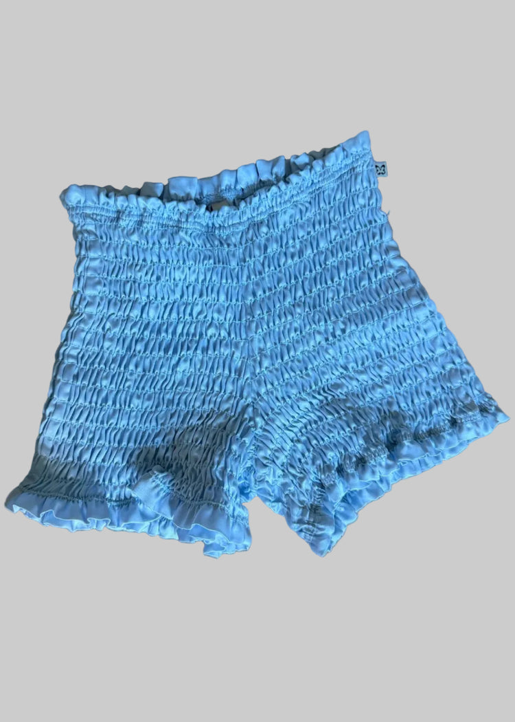 magic mini shorts ancient water flat photo