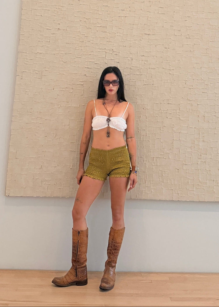 model wearing moss magic mini shorts 